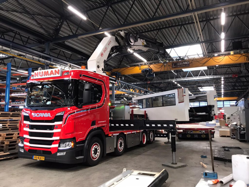 Numan truck inside factory hall