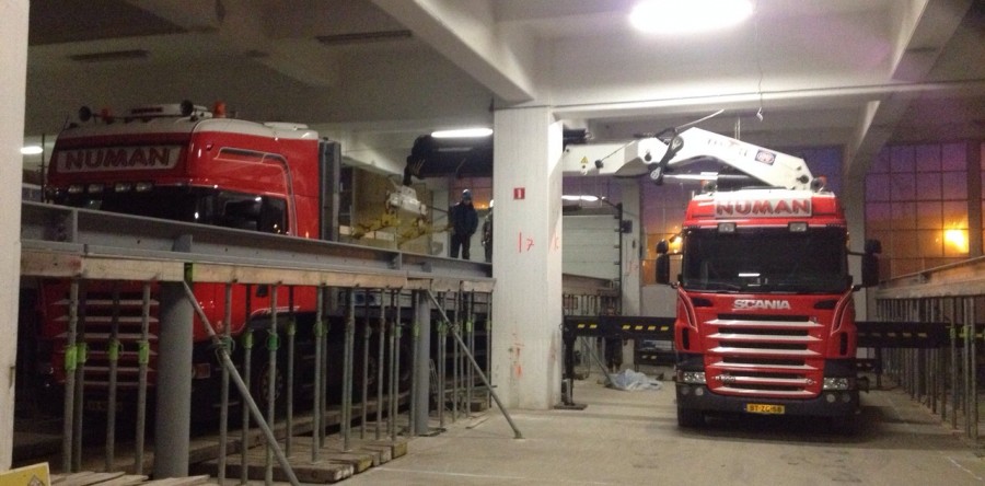 Numan trucks inside factory location